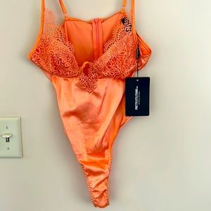 Women’s body suit top size 4